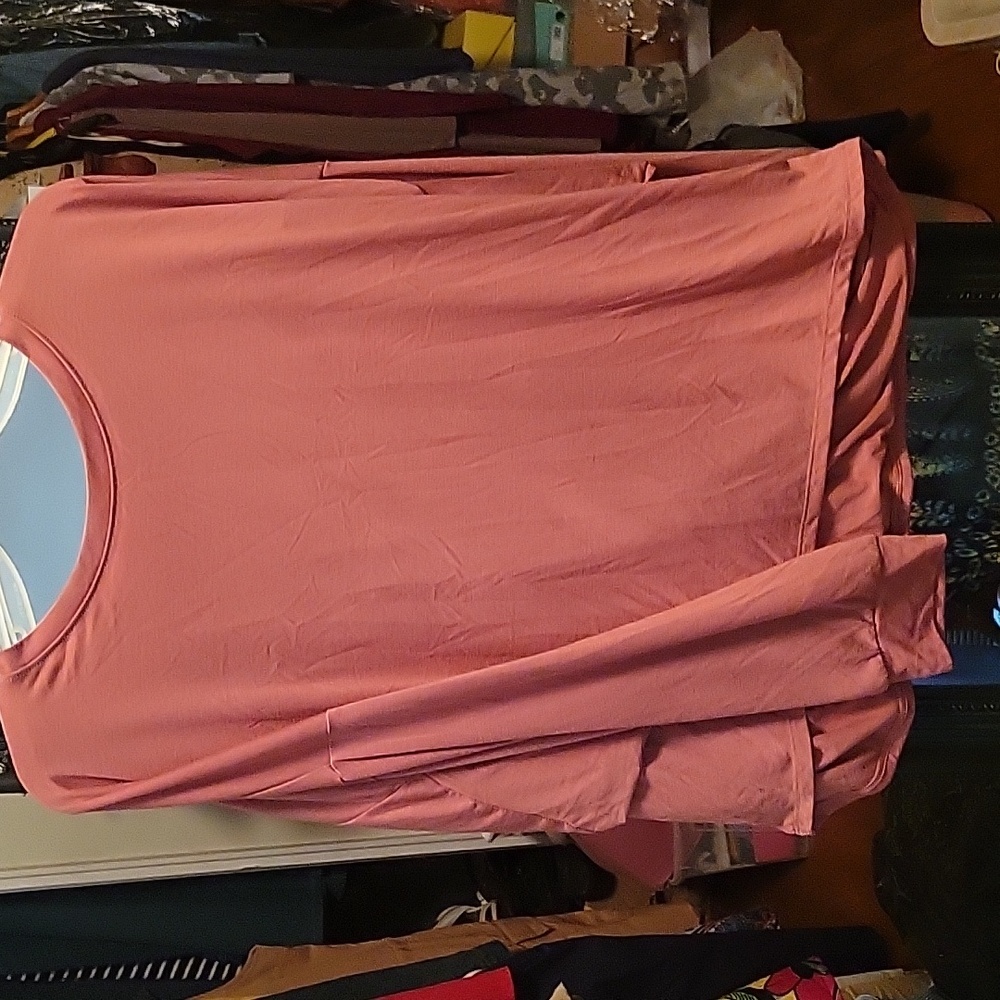 Salmon pink top.
